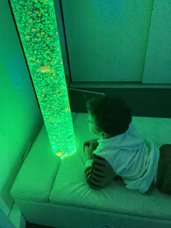 Child indoors smiling