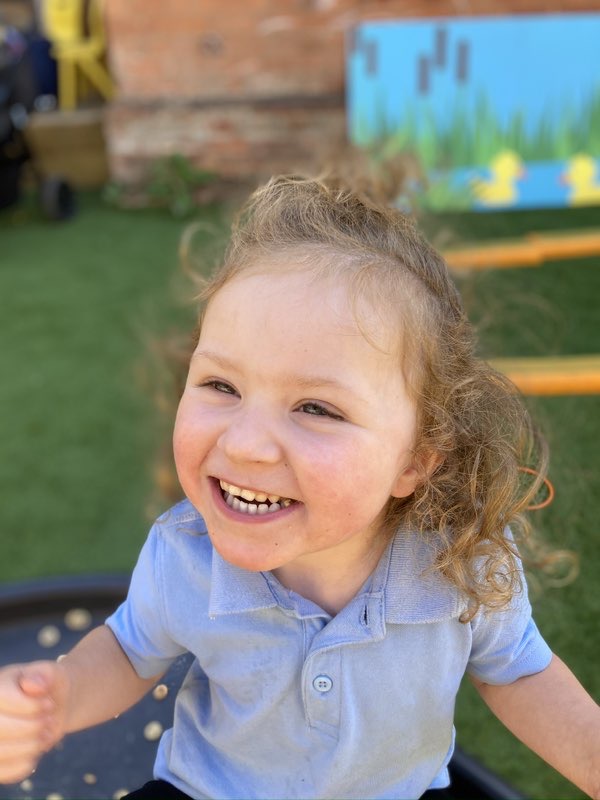 Child playing with balls