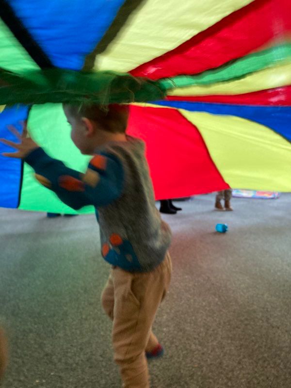 Children taking part in music and song time